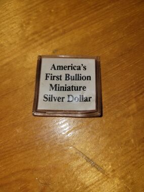 America's First Bullion Miniature Silver Dollar Display